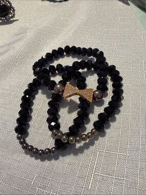 Claire's Black Beaded Bracelet with Gold Bow Accent